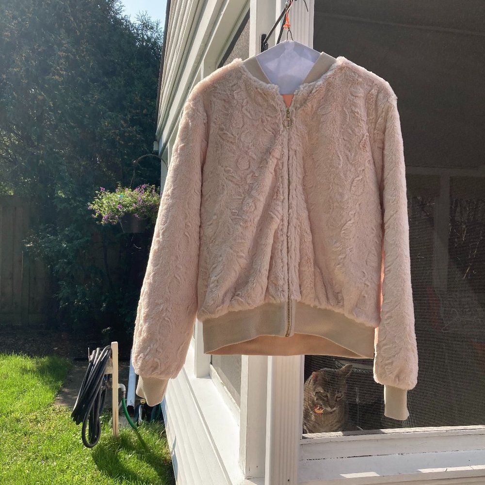 Have pale pink plush bomber jacket